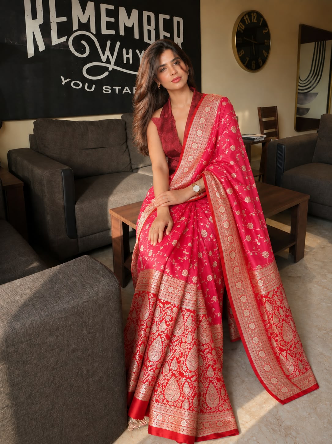 Editorial fashion portrait of a woman in a contemporary rose-and-gold draped saree, soft studio lighting